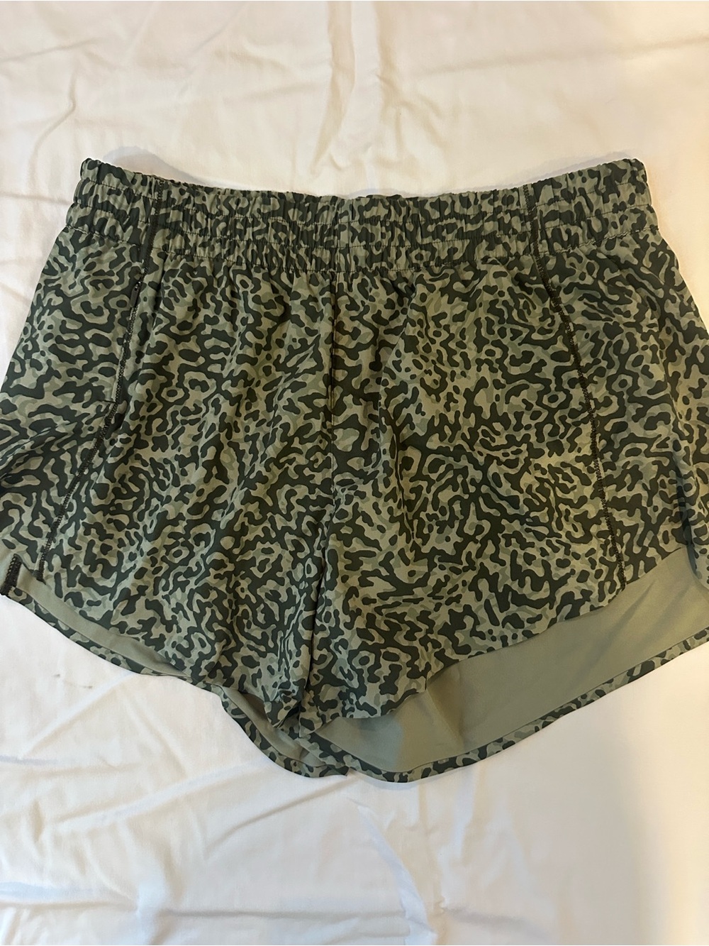 Athleta 3" Hustle shorts- olive green clouded camo/leopard print